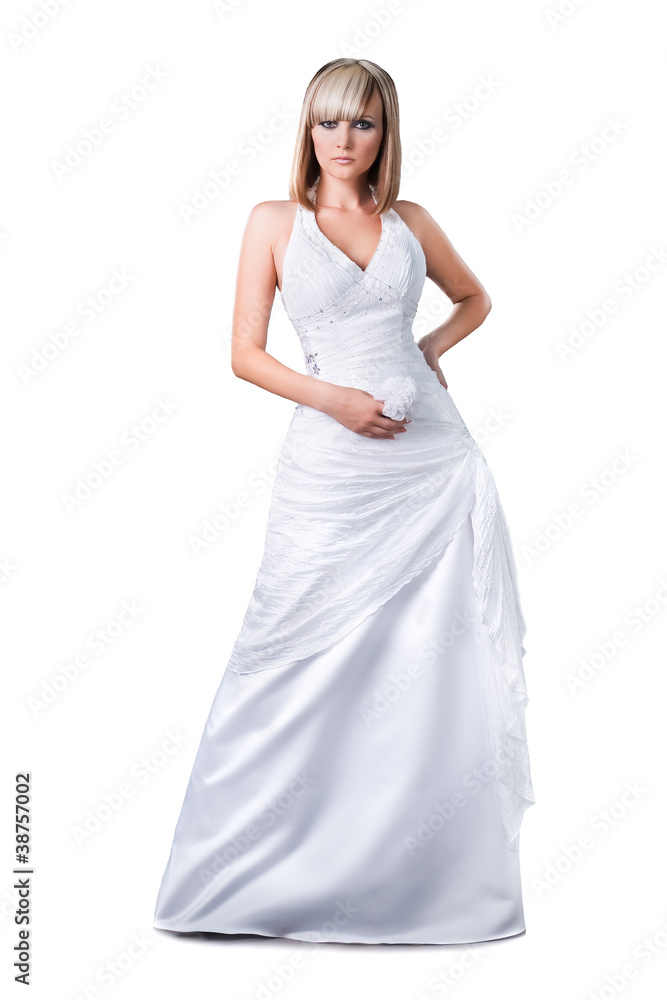 confident blond bride wearing wedding dress isolated on white confident blond bride wearing wedding dress isolated on white