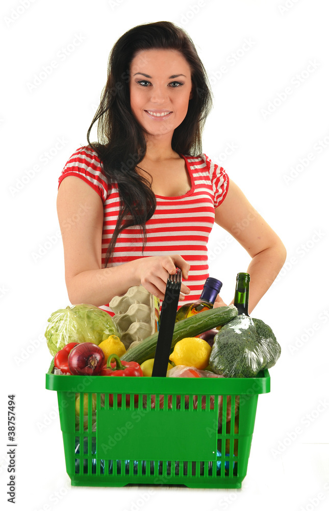 Young woman with shopping basket isolated on white Young woman with shopping basket isolated on white