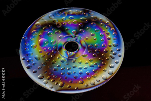 Cd in Rainbows with water drops