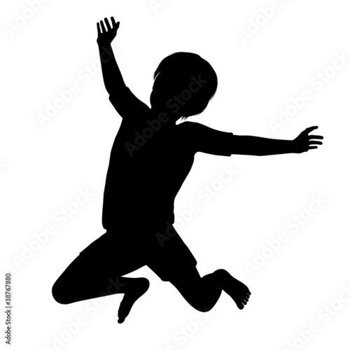 Silhouette of a healthy young child jumping high into the air
