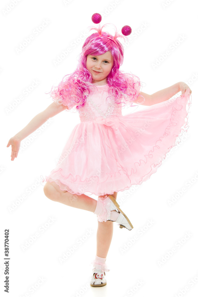 A girl with pink hair in a pink dress dancing
