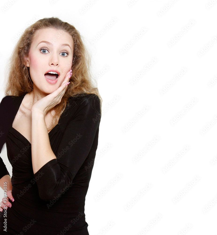 studio shot of young surprised woman over white studio shot of young surprised woman over white