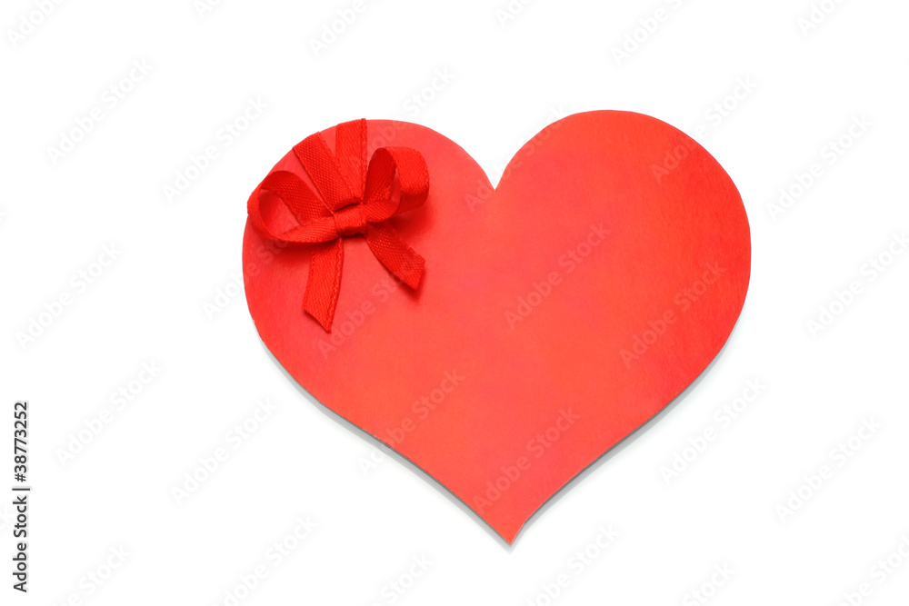 Heart with red bow on white background