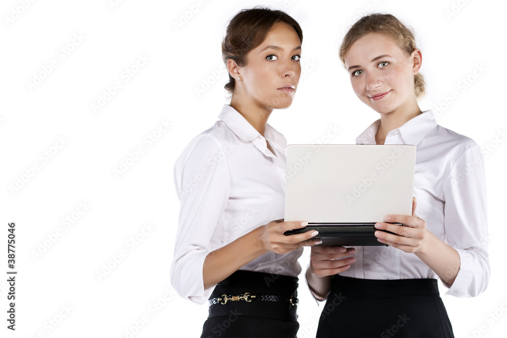 Portrait of two young businesswomen in the studio Portrait of two young businesswomen in the studio