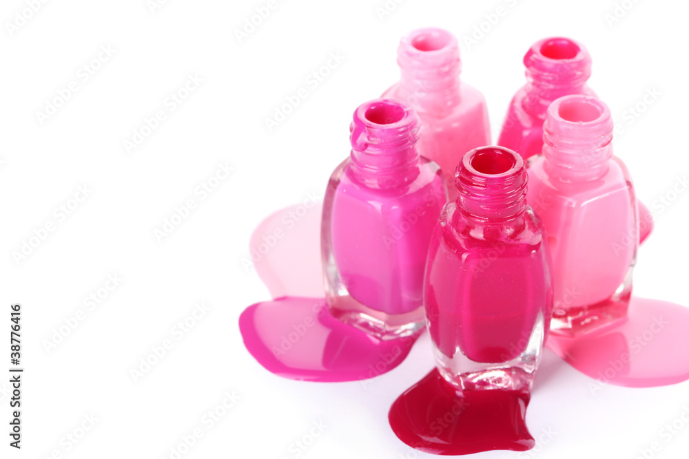 open bottles with bright nail polish isolated on white open bottles with bright nail polish isolated on white