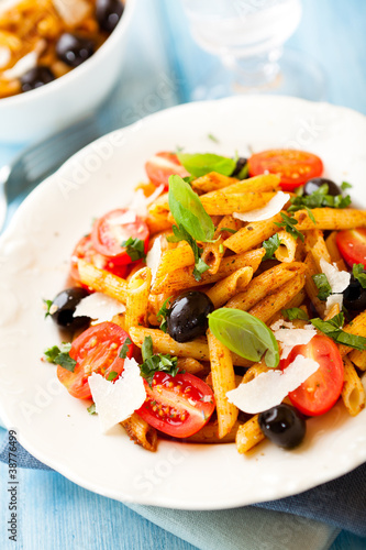 Penne with cherry tomatoes, olives and pesto