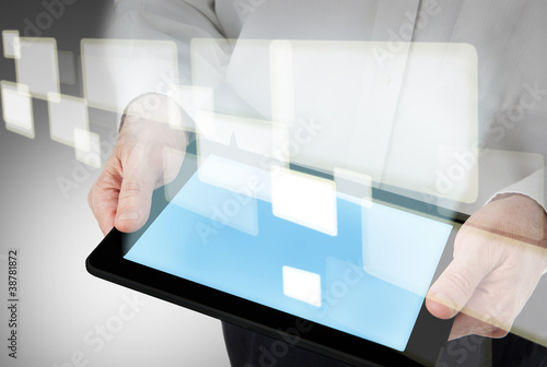 business man hold a modern tablet pc