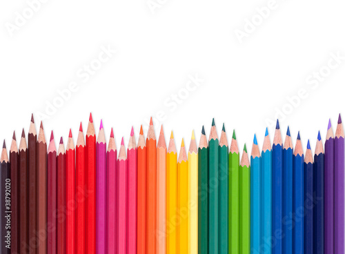 color pencils with different color over white background