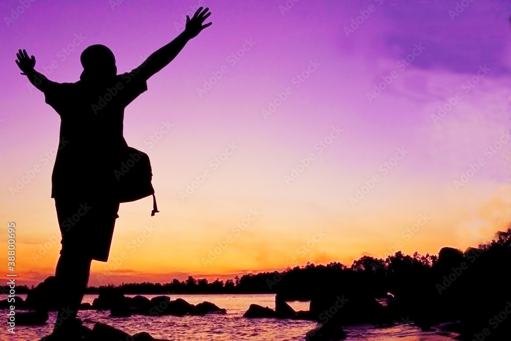 Fototapeta premium man in colorful sun set