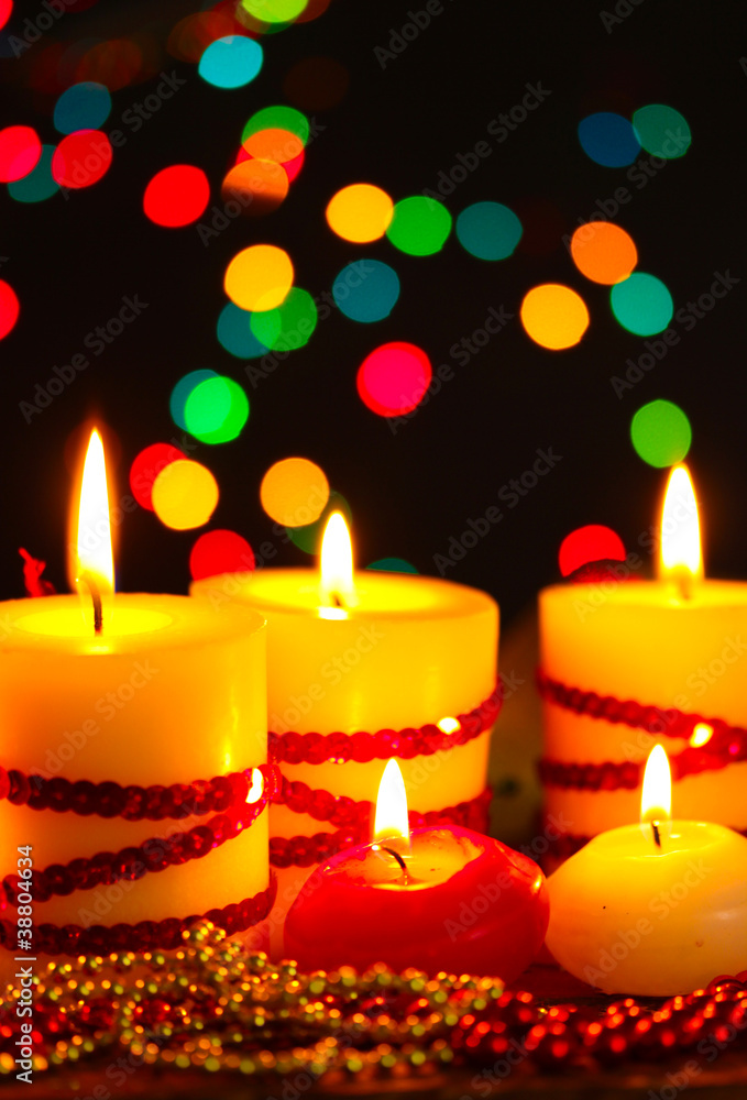 Beautiful candles and decor on wooden table on bright background Beautiful candles and decor on wooden table on bright background