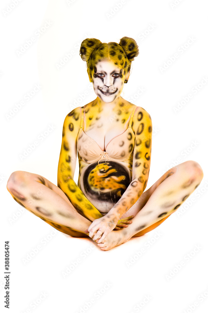 Pregnant woman with body-art as leopard Pregnant woman with body-art as leopard