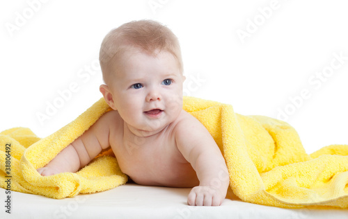 cute baby boy in yellow tow...