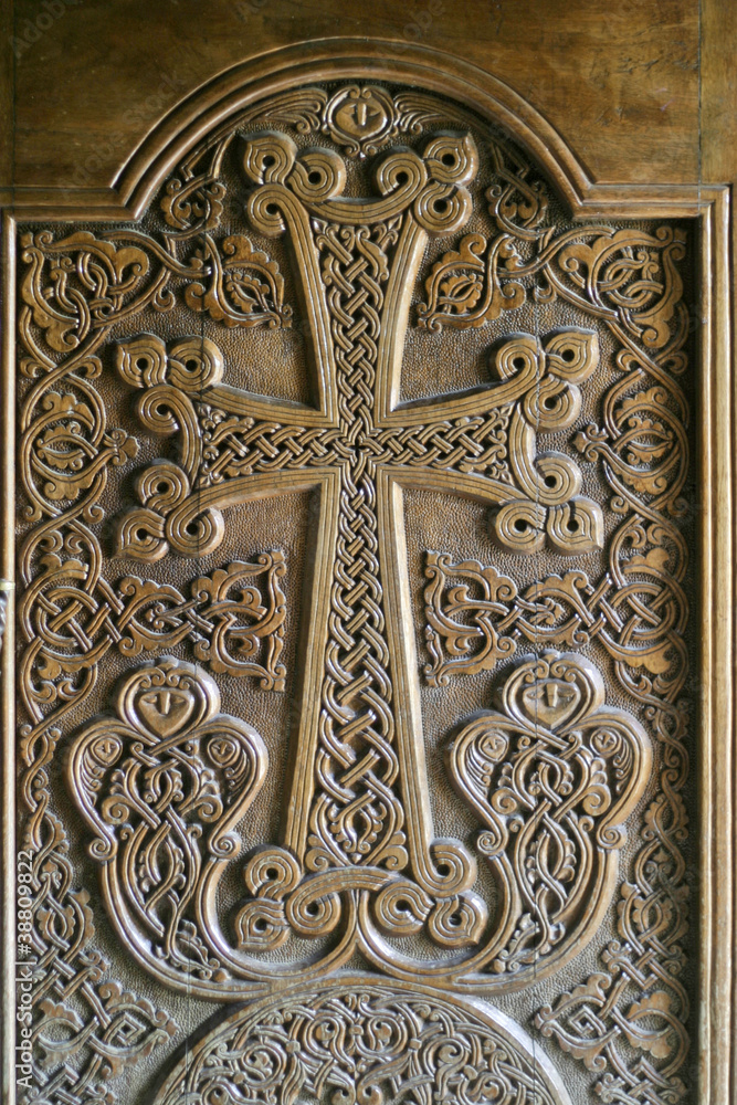 cross on wooden door