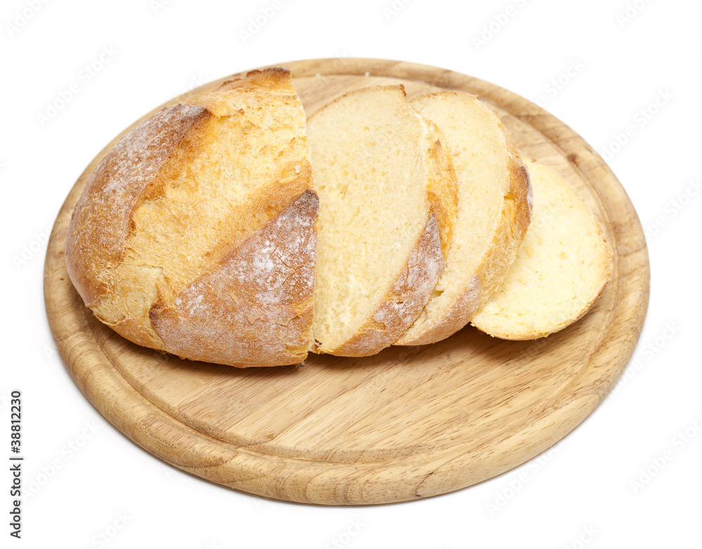 freshly baked bread on wooden cutting board freshly baked bread on wooden cutting board