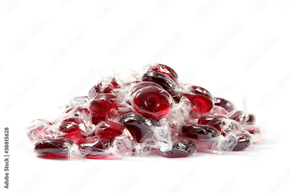 Rote Bonbons auf einem Haufen Stock Photo | Adobe Stock