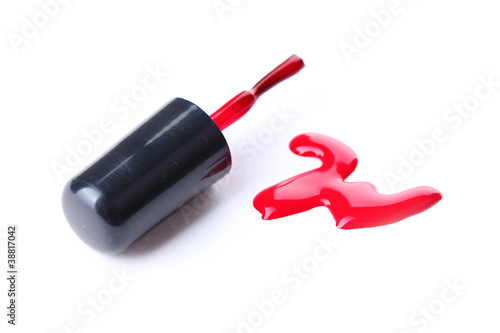red nail polish and brush isolated on white