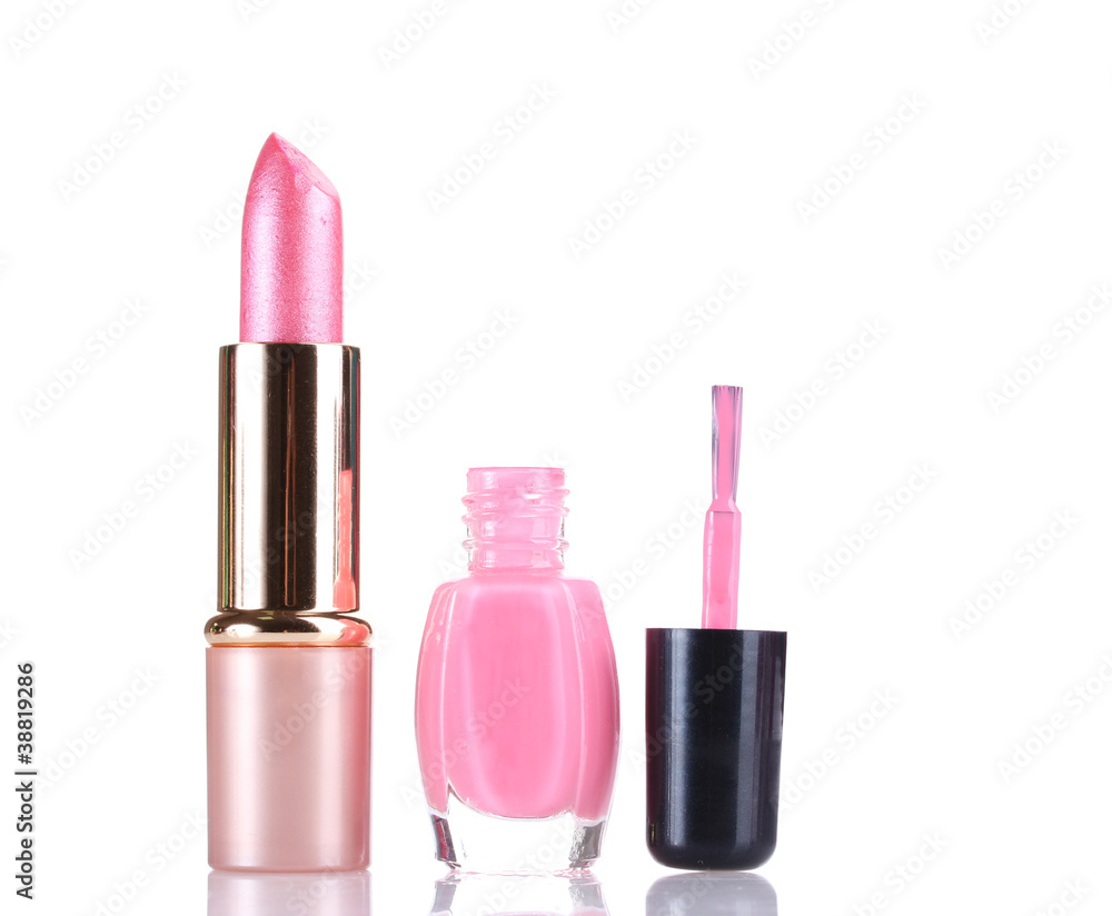 Pink lipstick and nail polish isolated on white Pink lipstick and nail polish isolated on white