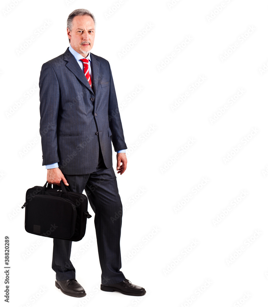 Full length businessman holding briefcase