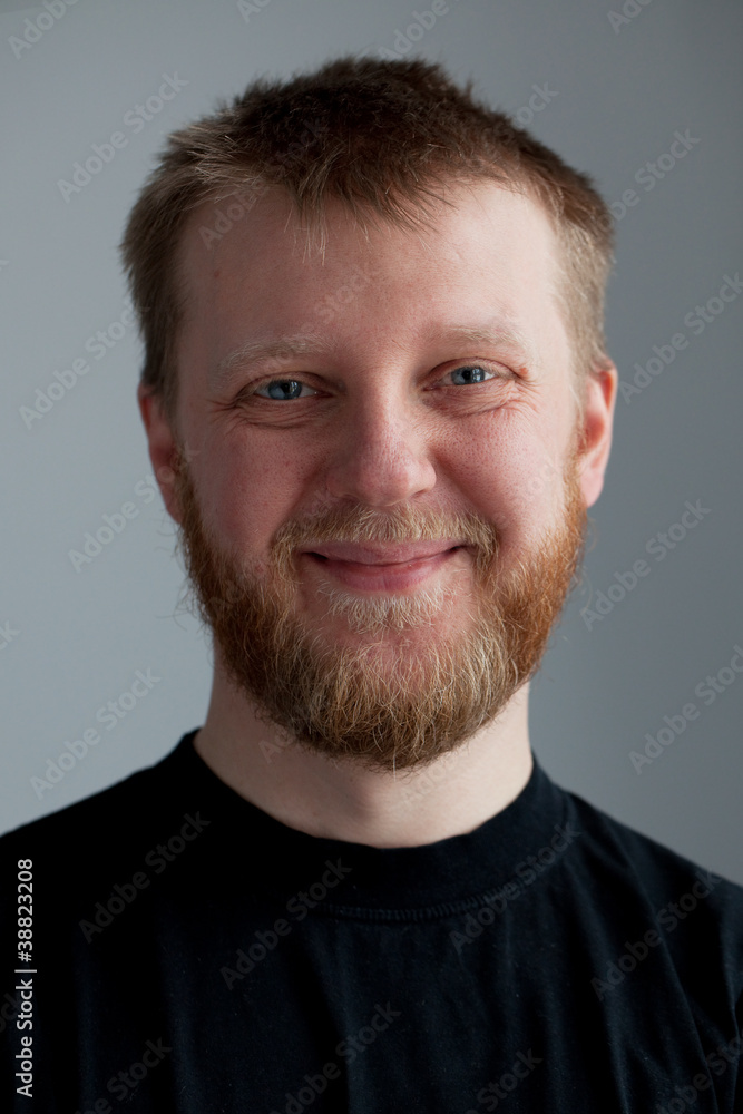 Young upbeat guy with a beard Young upbeat guy with a beard