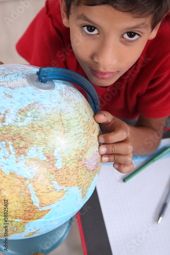 schoolboy interested in geography