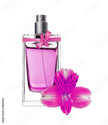 women's perfume in beautiful bottle with pink orchid isolated on