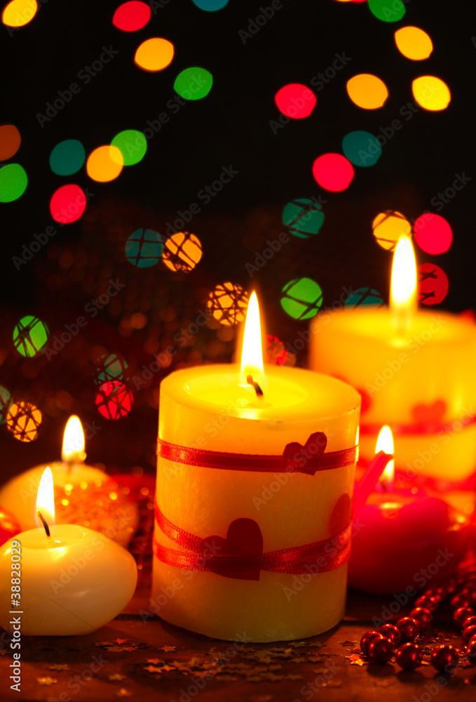 Beautiful candles on wooden table on bright background Beautiful candles on wooden table on bright background
