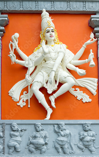 Hindu Goddess with Many Arms Temple Statue photo