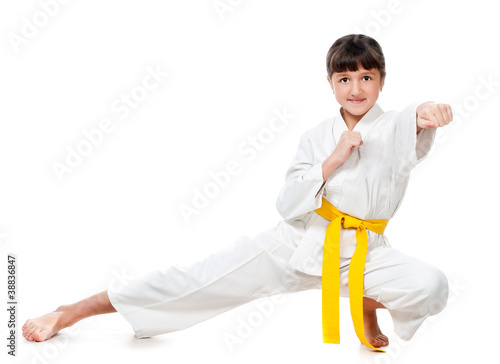 little girl in a kimono with a yellow sash