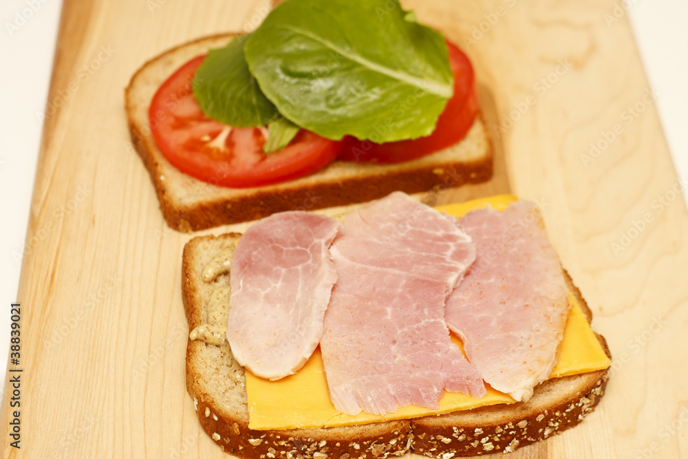 Ham and Cheese Sandwich with Tomato and Lettuce Ham and Cheese Sandwich with Tomato and Lettuce