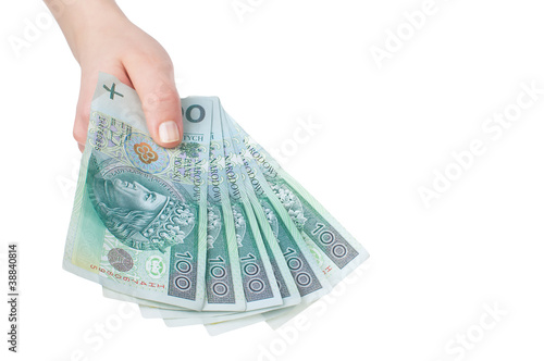 polish banknotes hundred in hands photo