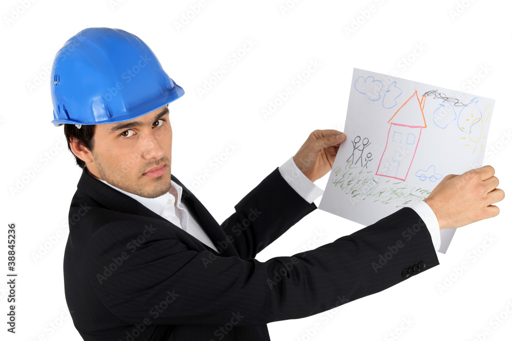 Architect with a child's drawing of a house Architect with a child's drawing of a house