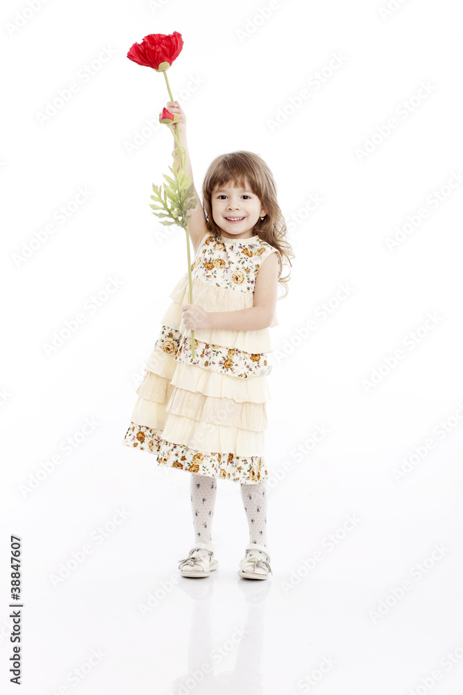 Summer smiling portrait of a little girl playing with a flower Summer smiling portrait of a little girl playing with a flower