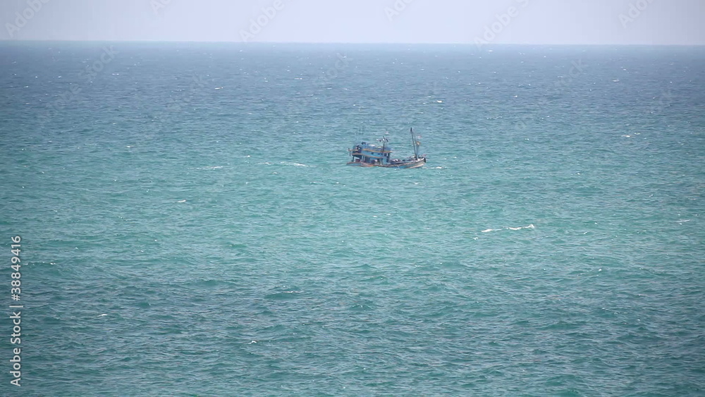 Fishing ship in open sea timelapse