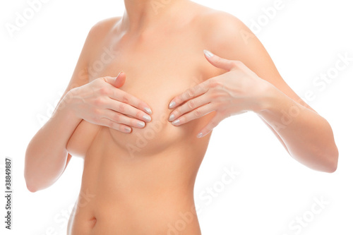 woman examining breast