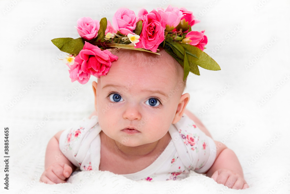 a large portrait of a cute little girl with a beautiful flower a large portrait of a cute little girl with a beautiful flower