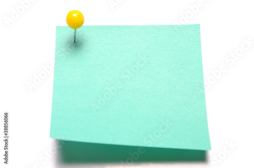 Blank light green recycle sticky note with yellow push pin