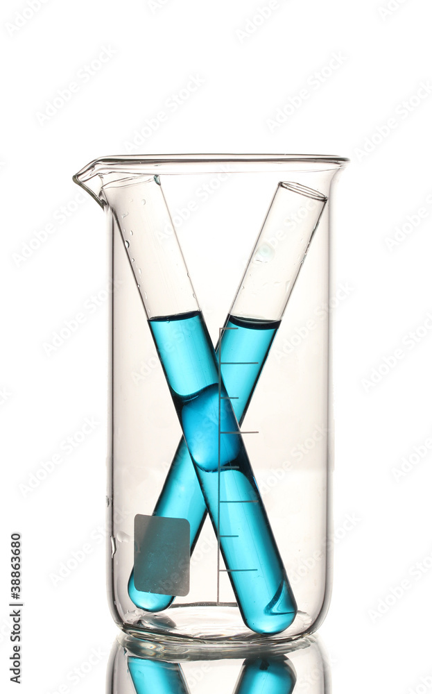 Laboratory tubes with blue liquid in measuring beaker with Laboratory tubes with blue liquid in measuring beaker with