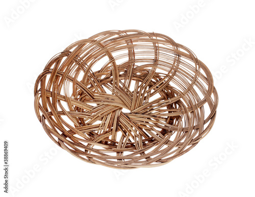 Brown wicker basket on the white background