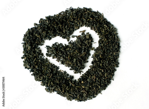 Green tea in heart and round shape isolated