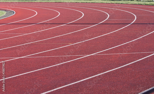 The Curves of an Athletics Track with a Red Surface.