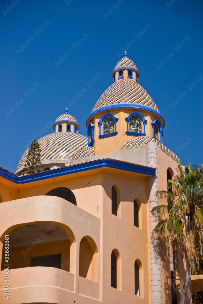 Colorful tiled dome Mexican building