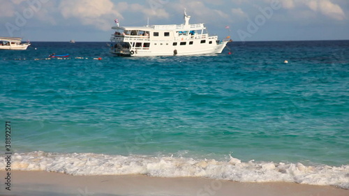 Andaman sea. Focus on a foregraund waves. photo