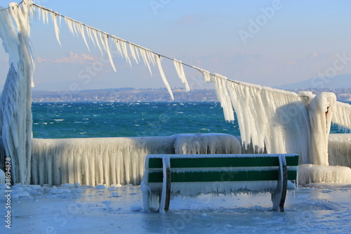 Frozen benches, Nyon, Switzerland photo