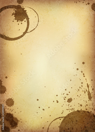 Classic vintage background. Old paper sheet with stains of coffe