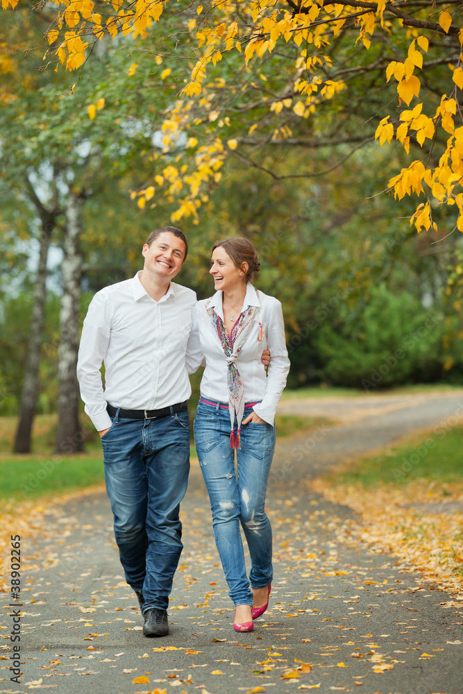 Romantic young beautiful couple on autumn walk Romantic young beautiful couple on autumn walk