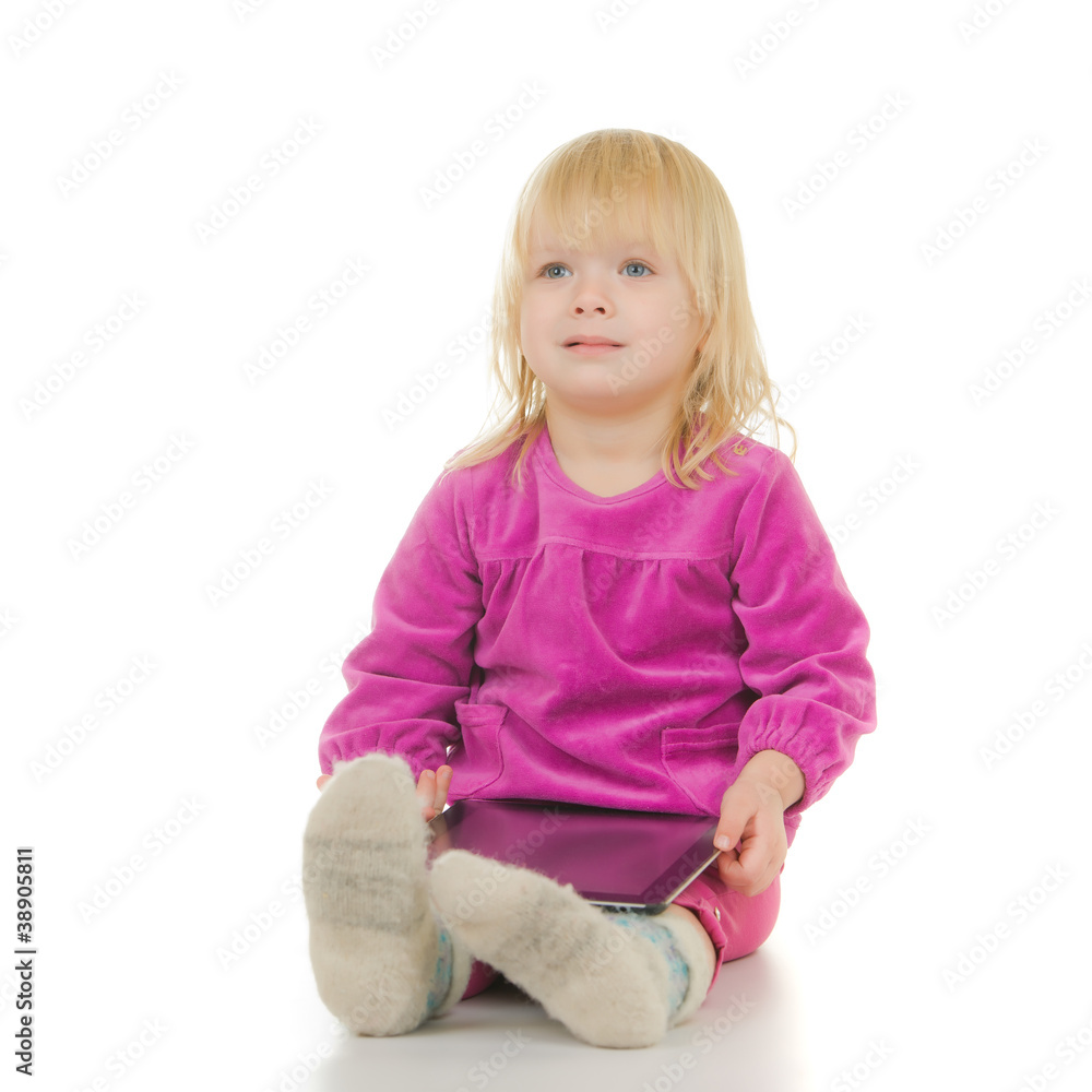 Adorable baby sit with tablet computer on white background Adorable baby sit with tablet computer on white background