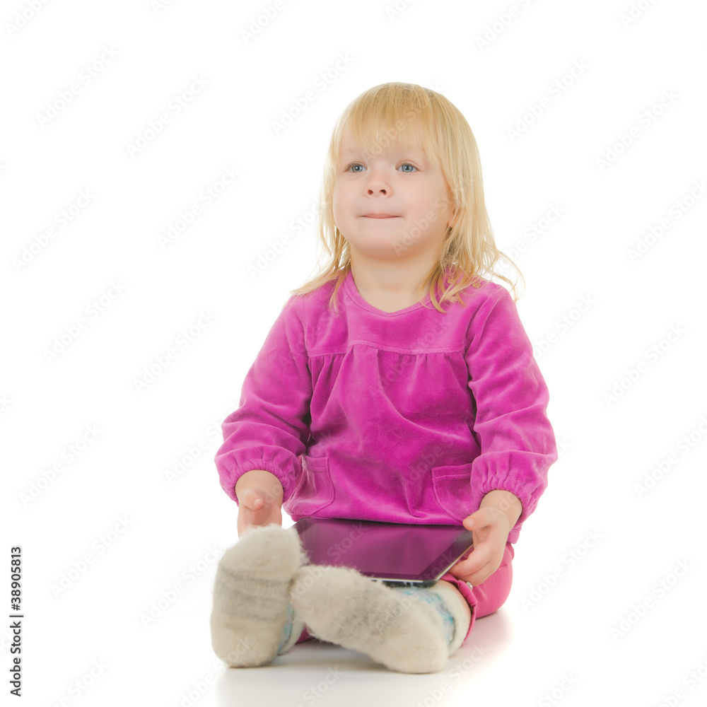 Adorable baby sit with tablet computer on white background Adorable baby sit with tablet computer on white background