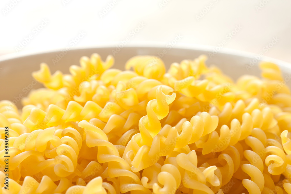 Raw yellow macaroni Raw yellow macaroni