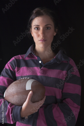 Girl with an oval football