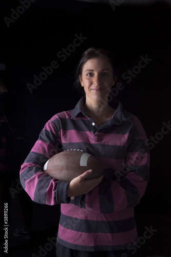 Girl with an oval football